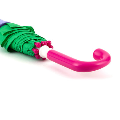 close up of the handle of a brightly colored childrens umbrella in a lavender owl design with big eyes, green trim and pop-up fuchsia "ears" on top. matching fuchsia curved crook handle.