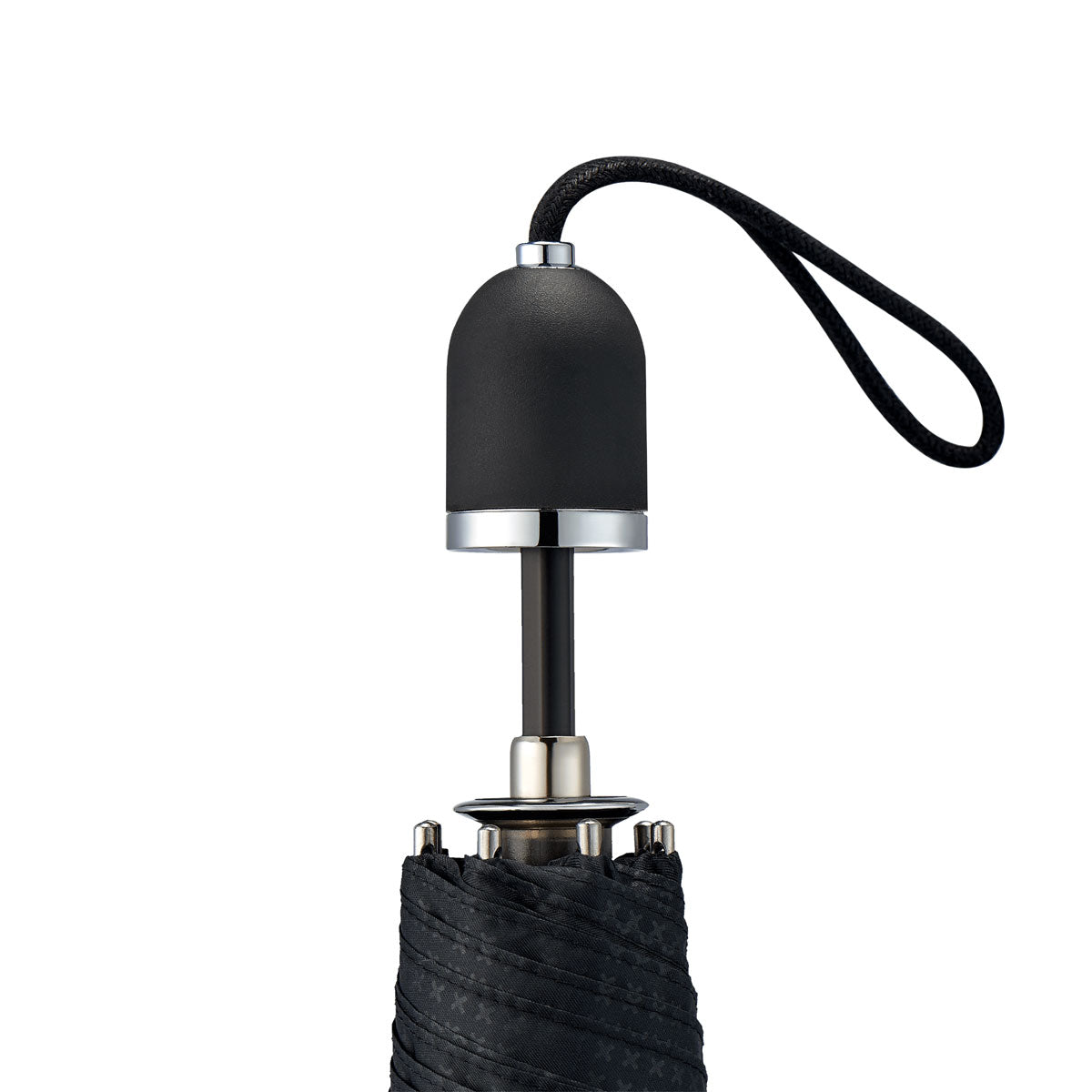 straight on view of a handmade manual open compact luxury umbrella with a matte black TPR grip handle, detachable waxed cotton wrist strap, Teflon-coated fine denier woven black polyester twill canopy, chrome trim, Trilobe aircraft aluminum shaft, fiberglass ribs, and a reflective strap embroidered with “ShedRain Stratus" in its free-standing canvas case with a close-up of the handle.