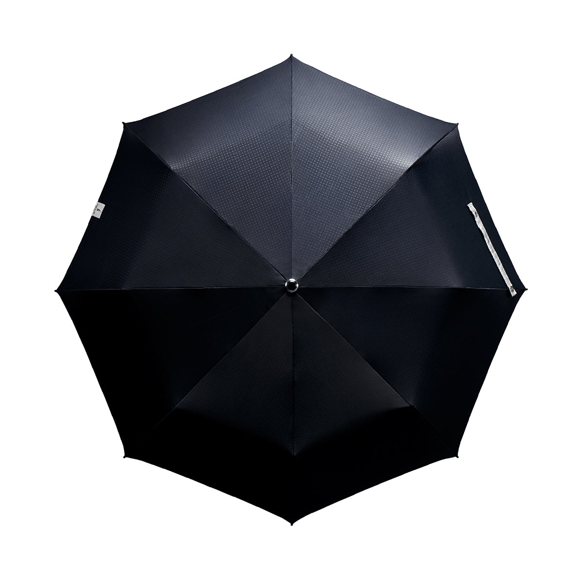 topical view of a handmade manual open compact luxury umbrella with a glossy piano finish bright white handle, detachable waxed cotton wrist strap, Teflon-coated fine denier woven black polyester twill canopy, chrome trim, Trilobe aircraft aluminum shaft, fiberglass ribs, and a reflective strap embroidered with “ShedRain Stratus.”