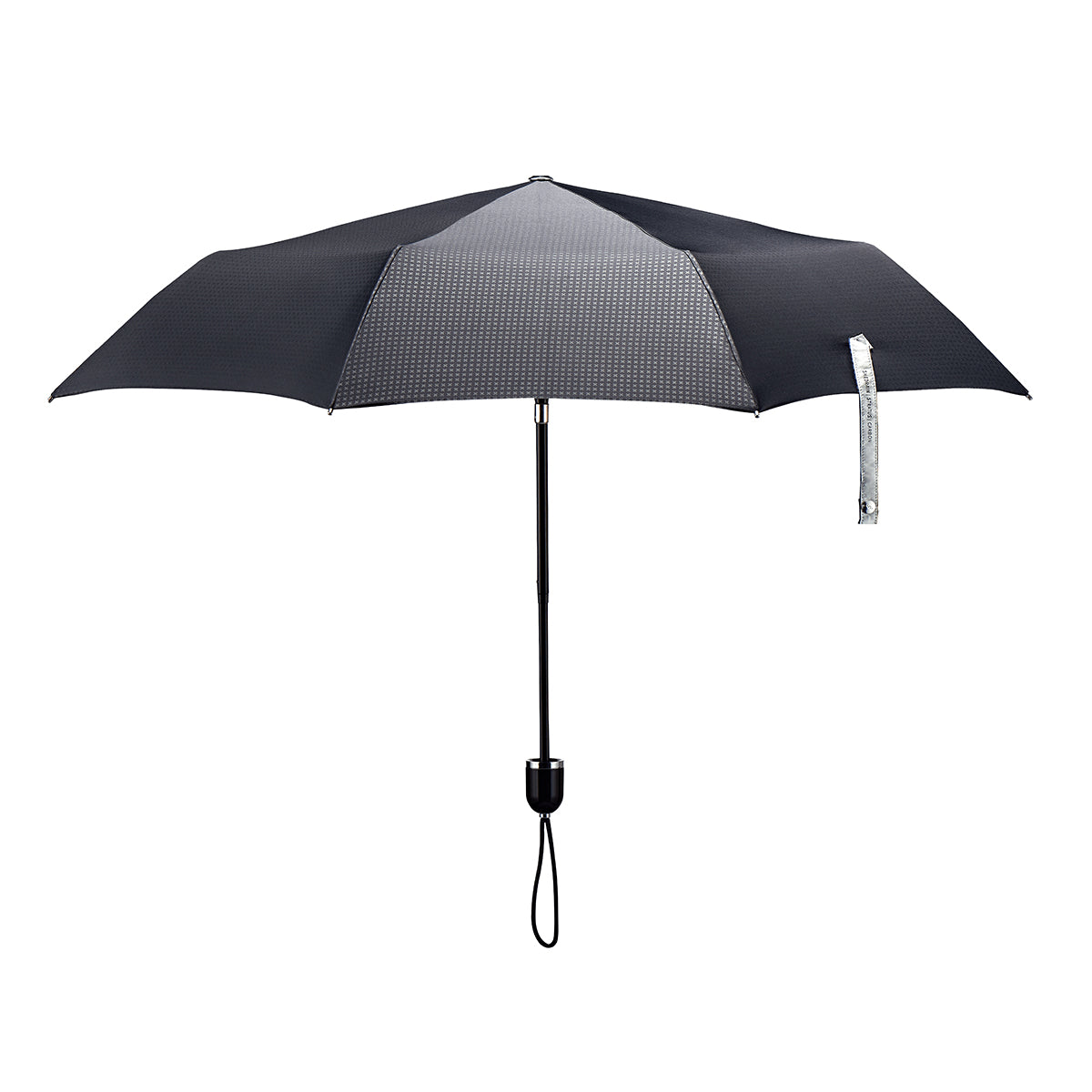 straight on view of a handmade manual open compact luxury umbrella with a glossy piano finish black handle, detachable waxed cotton wrist strap, Teflon-coated fine denier woven black polyester twill canopy, chrome trim, Trilobe aircraft aluminum shaft, fiberglass ribs, and a reflective strap embroidered with “ShedRain Stratus.”